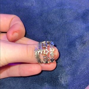 Intricate Silver Halo Ring with Sparkling Stones